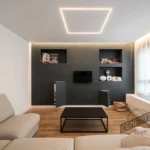 Wall cladding with Cementec ready-to-use microcement in living room.